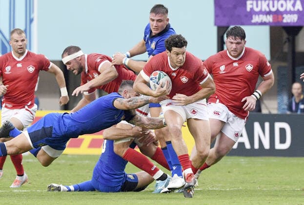 Rugby World Cup in Japan: Italy v Canada Ciaran Hearn of Canada bursts through the defense during the first half of a Rugby World Cup Pool B match against Italy on Sept. 26, 2019, in Fukuoka, southwestern Japan. 