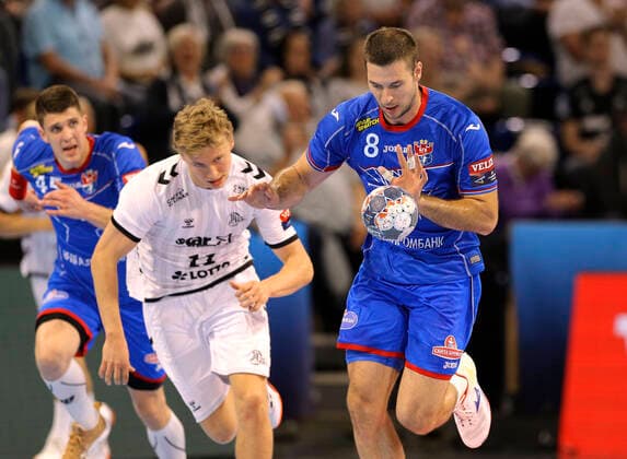 Photo on the ball Marko Panic against Gisli Kristjansson Kiel Handball Men Champions League at Mi 25 09 2019 THW Kiel HC Meshkov Brest 30 23