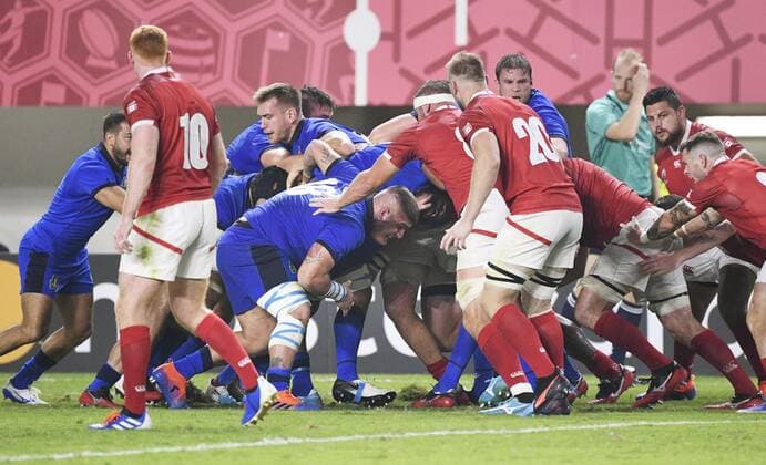 Rugby World Cup in Japan: Italy v Canada Italy players (blue) push in a maul during the second half of a Rugby World Cup Pool B match against Canada on Sept. 26, 2019, in Fukuoka, southwestern Japan. 