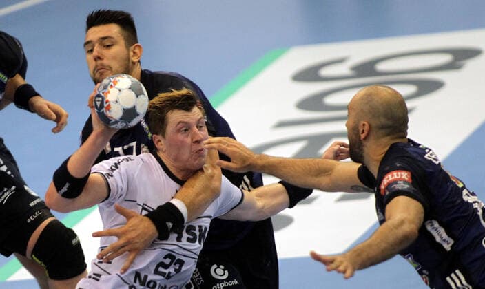 28.09.2019 Szeged(Hungary) MOL Pick Szeged-SG Flensburg-Handewitt EHF Champions League men s handball Goeran Johannessen(C)SG Flensburg-Handewitt in duel with Bence Banhidi(L) MOL Pick Szeged : 