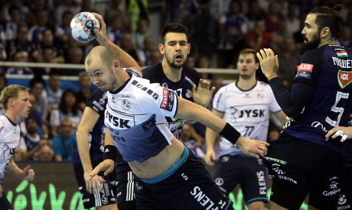 28.09.2019 Szeged(Hungary) MOL Pick Szeged-SG Flensburg-Handewitt EHF Champions League men s handball Simon Hald(L)SG Flensburg-Handewitt shoot beside Bence Banhidi(c),Jorge Maqueda Pena(R) MOL Pick Szeged : 