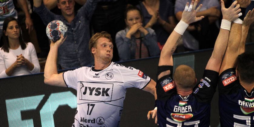 28.09.2019 Szeged(Hungary) MOL Pick Szeged-SG Flensburg-Handewitt EHF Champions League men s handball Simon Jeppsson(L)SG Flensburg-Handewitt last shoot at match through MOL Pick Szeged defence players : 