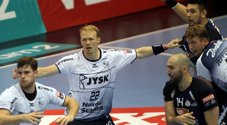28.09.2019 Szeged(Hungary) MOL Pick Szeged-SG Flensburg-Handewitt EHF Champions League men s handball Anders Zachariassen(C) with Simon Jeppsson(R) SG Flensburg-Handewitt stopped Bence Banhidi(right behind) ,Joan Canellas Reixach (front)MOL Pick Szeged : 