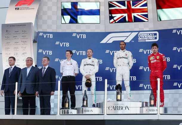 SOCHI, RUSSIA – SEPTEMBER 29, 2019: Russia s Energy Minister Alexander Novak, Andrei Kostin, president and chairman of the management board at VTB Bank, Russia s Deputy Prime Minister Dmitry Kozak, Mercedes chief engineer Fred Judd, Mercedes AMG Petronas driver Valtteri Bottas of Finland, second-placed, Mercedes AMG Petronas driver Lewis Hamilton of the United Kingdom, first-placed, and Scuderia Ferrari F1 driver Charles Leclerc of Monaco, third-placed, from left, celebrate during the 2019 Formula One Russian Grand Prix victory ceremony at the Sochi Autodrom racing circuit. Sergei Fadeichev TASS TS0BCCCA