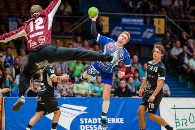 Jonas Hoenicke 20 Dessau Rosslauer HV 06 , Max Folchert 12 HSG Ostsee Nordhorn , Alexander Mendle 15 HSG Ostsee Nordhorn during the match in the 3 League Handball Mens Season 2019 2020 between Dessau Rosslauer HV 06 and HSG Ostsee Nordhorn N G in the Anhalt Arena on 29 September 2019 in Dessau Rosslau, Saxony Anhalt, Germany