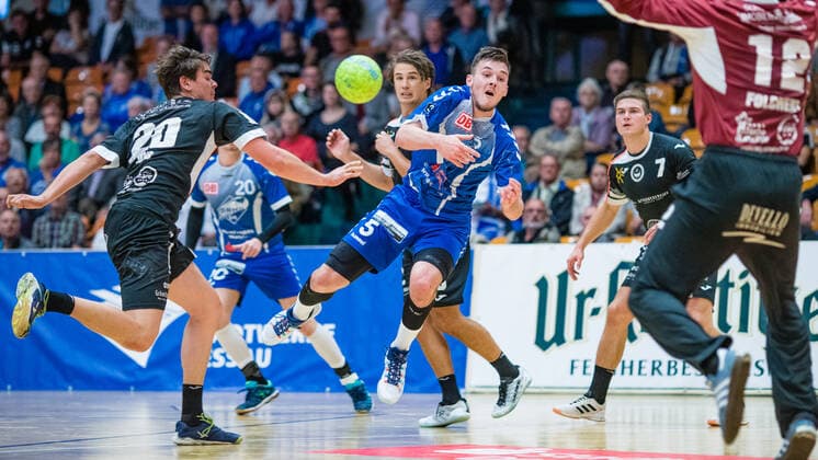 Timo Löser 5 Dessau Rosslauer HV 06 throwing at the goal of Max Folchert 12 HSG Ostsee Nordhorn during the match in the 3 League Handball Men Season 2019 2020 between Dessau Rosslauer HV 06 and HSG Ostsee Nordhorn N G in the Anhalt Arena on 29 September 2019 in Dessau Rosslau, Saxony Anhalt, Germany