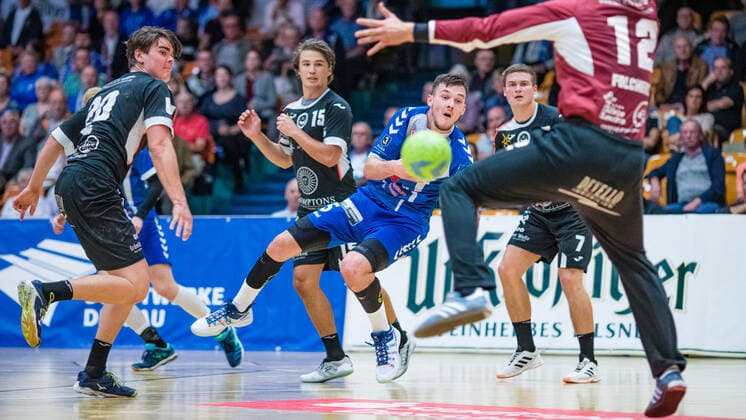 Timo Löser 5 Dessau Rosslauer HV 06 throwing at the goal of Max Folchert 12 HSG Ostsee Nordhorn during the match in the 3 League Handball Men Season 2019 2020 between Dessau Rosslauer HV 06 and HSG Ostsee Nordhorn N G in the Anhalt Arena on 29 September 2019 in Dessau Rosslau, Saxony Anhalt, Germany