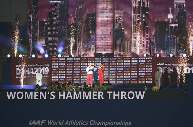 (190929) -- DOHA, Sept. 29, 2019 -- Gold medalist DeAnna Price (C) of the United States, silver medalist Joanna Fiodorow (C-L) of Poland and bronze medalist Wang Zheng (C-R) of China pose for pictures at the awarding ceremony of women s hammer throw during the 2019 IAAF World Athletics Championships in Doha, Qatar, on Sept. 29, 2019. ) (SP)QATAR-DOHA-IAAF WORLD ATHLETICS CHAMPIONSHIPS-WOMEN S HAMMER THROW-AWARDING CEREMONY JiaxYuchen 