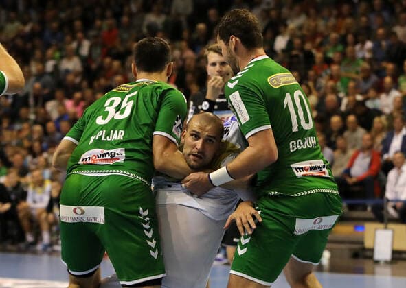 Marko Kopljar, Zeljko Musa, Jakov Gojun action game scene duel sport handball DHB trophy men season 2019 2020 01 10 2019 foxes Berlin vs SC Magdeburg