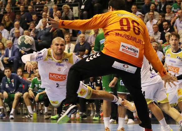 Zeljko Musa, goalkeeper Dejan Milosavljev action game scene duel sport handball DHB trophy men season 2019 2020 01 10 2019 foxes Berlin vs SC Magdeburg