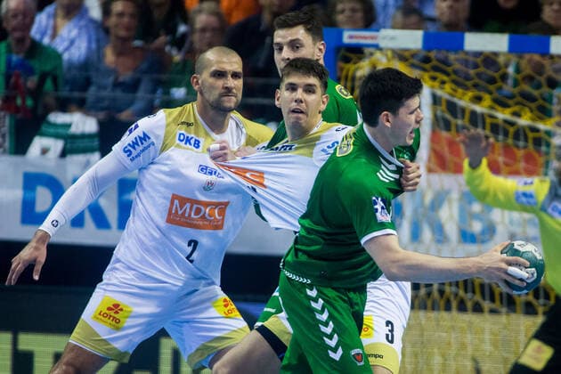 01 10 2019, xfrx, Handball DHB Cup, Fuechse Berlin SC Magdeburg emspor, v l Piotr Chrapkowski SC Magdeburg ,Simon Ernst Fuechse Berlin DFL DFB REGULATIONS PROHIBIT ANY USE OF PHOTOGRAPHS as IMAGE SEQUENCES and or QUASI VIDEO Berlin