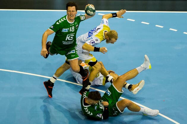 01 10 2019, xfrx, Handball DHB Cup, Fuechse Berlin SC Magdeburg emspor, v l Hans Lindberg Fuechse Berlin ,Matthias Musche SC Magdeburg DFL DFB REGULATIONS PROHIBIT ANY USE OF PHOTOGRAPHS as IMAGE SEQUENCES and or QUASI VIDEO Berlin