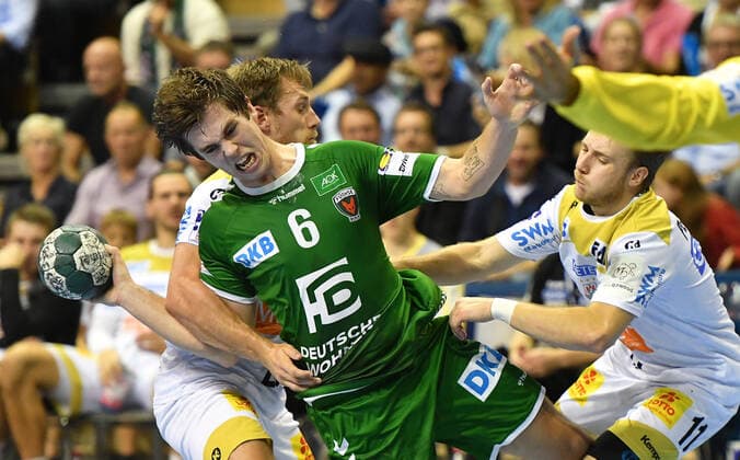 Jacob Tandrup Holm Füchse , at the litter, right Daniel Pettersson Magdeburg ,, front Yannik Green Krejberg Goalkeeper Magdeburg , Füchse Berlin SC Magdeburg DHB Cup, Round of 16 2019 2020, Men, Men, Handball, Germany, Germany, Max Schmeling Halle Berlin, 1 10 2019