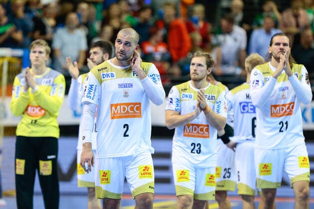 01 10 2019, xtgx, Handball DHB Cup, Fuechse Berlin SC Magdeburg emspor, v l Magdeburg around Zeljko Musa Magdeburg, 2 disappointed, looks disappointed, knocked down, disappointed Berlin