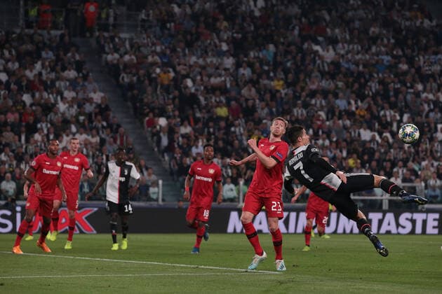Cristiano Ronaldo of Juventus attempts a bicycle kick during the UEFA Champions League match at Juventus Stadium, Turin. Picture date: 1st October 2019. Picture credit should read: Jonathan Moscrop Sportimage EDITORIAL USE ONLY. No use with unauthorised audio, video, data, fixture lists, club league logos or live services. Online in-match use limited to 120 images, no video emulation. No use in betting, games or single club league player publications. SPI-0234-0018