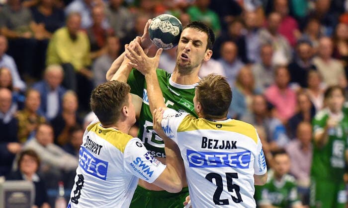 Marko Kopljar Füchse , with ball, front Christoph Steinert Magdeburg , Marko Bezjak Magdeburg , Füchse Berlin SC Magdeburg DHB Cup, Round of 16 2019 2020, Men, Men, Handball, Germany, Germany, Max Schmeling Halle Berlin, 1 10 2019