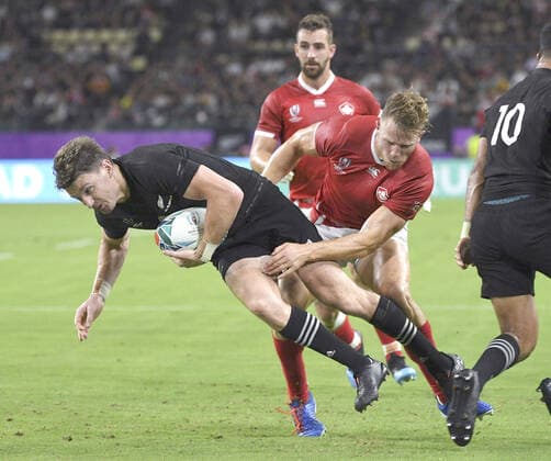 Rugby World Cup in Japan: New Zealand v Canada Beauden Barrett (L) of New Zealand is tackled by a Canada player during the first half of a Rugby World Cup Pool B match on Oct. 2, 2019, in Oita, southwestern Japan. 