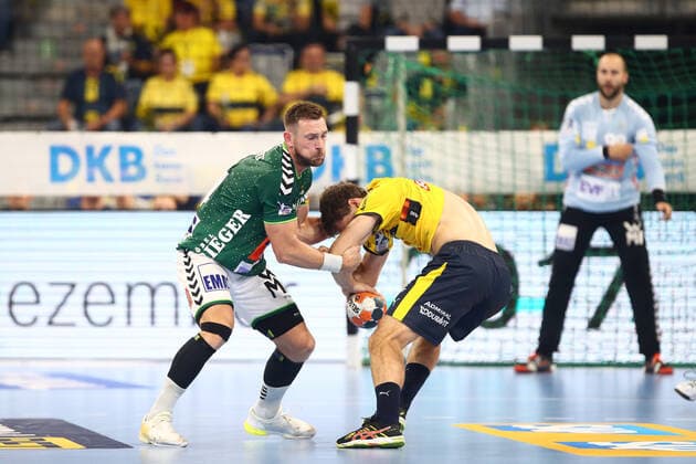 Jacob Bagersted Goeppingen pulls Niclas Kirkelokke Rhein Neckar Loewen almost the jersey from Rhein Neckar Loewen vs Frischauf Goeppingen, Handball, DHB Pokal, 02 10 2019 Rhein Neckar Loewen vs Frischauf Goeppingen, Handball, DHB Pokal, 02 10 2019 Mannheim, Germany Copyright: xEIBNER RenexWeissx EP_RWS