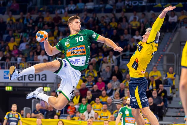 Mannheim, Germany 02 October 2019 DHB Cup Round of the Sixteen Rhein Neckar Löwen vs Frisch Auf Göppingen v li Sebastian Heymann Goeppingen , Andy Schmid Loewen Mannheim SAP Arena Baden Württemberg Germany