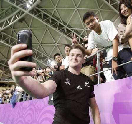 Rugby World Cup: New Zealand v Canada New Zealand winger Jordie Barrett takes a selfie with fans after a 63-0 win over Canada in their Rugby World Cup match in Oita, Japan, on Oct. 2, 2019. 