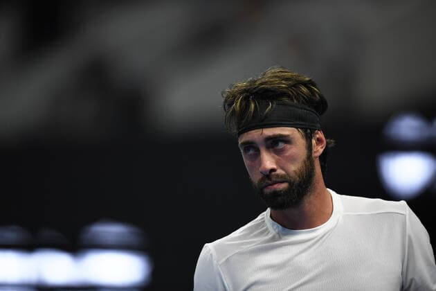 (191003) -- BEIJING, Oct. 3, 2019 -- Nikoloz Basilashvili of Georgia reacts during the men s singles second round match against Stefanos Tsitsipas of Greece at the 2019 China Open tennis tournament in Beijing, capital of China, Oct. 3, 2019. ) (SP)CHINA-BEIJING-TENNIS-CHINA OPEN-MEN S SINGLES(CN) LixYibo 