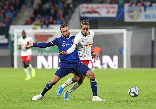 02 10 2019, football UEFA Champions League 2019 2020, group stage, 2 matchday, RB Leipzig Olympique Lyon, in the Red Bull Arena Leipzig L R Lucas Tousart Olympique Lyon vs. Yussuf Poulsen RB Leipzig DFL and DFB regulations prohibit any use of photographs as image sequences and or quasi video