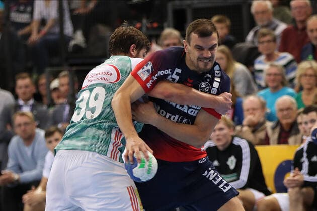 SG Flensburg Handewitt vs TSV Hannover Burgdorf, DHB Cup Round of 16, Flensburg 03 10 19 Michel Jurecki SG Flensburg Handewitt, 55 against Malte Donker TSV Hannover Burgdorf, 39 Copyright: xBEAUTIFULxSPORTS MarioxM.xKobergx