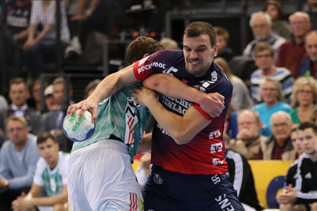 SG Flensburg Handewitt vs TSV Hannover Burgdorf, DHB Cup Round of 16, Flensburg 03 10 19 Michel Jurecki SG Flensburg Handewitt, 55 against Malte Donker TSV Hannover Burgdorf, 39 Copyright: xBEAUTIFULxSPORTS MarioxM.xKobergx