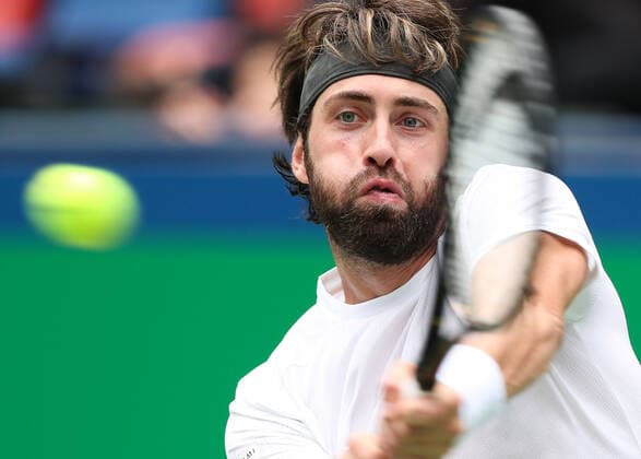 (191006) -- SHANGHAI, Oct. 6, 2019 -- Nikoloz Basilashvili of Georgia hits a return during the men s singles first round match between Nikoloz Basilashvili of Georgia and Radu Albot of Moldova at 2019 ATP, Tennis Herren Shanghai Masters tennis tournament in Shanghai, east China, on Oct. 6, 2019. ) (SP)CHINA-SHANGHAI-TENNIS-ATP MASTERS(CN) DingxTing 