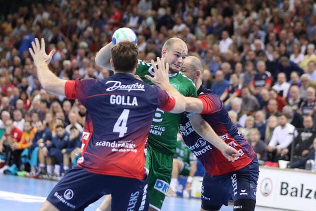 SG Flensburg Handewitt vs Fuechse Berlin, 06 10 19, LIQUI MOLY Handball Bundesliga, Paul Drux Fuechse Berlin, 95 against Johannes Golla SG Flensburg Handewitt, 04 and Simon Hald SG Flensburg Handewitt, 05 Copyright: xBEAUTIFULxSPORTS MarioxM.xKobergx