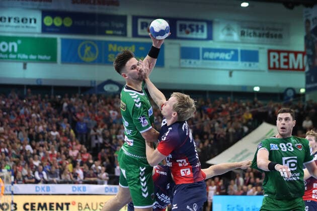 SG Flensburg Handewitt vs Fuechse Berlin, 06 10 19, LIQUI MOLY Handball Bundesliga, Fabian Wiede Fuechse Berlin, 03 against Magnus Joendal SG Flensburg Handewitt, 18 Copyright: xBEAUTIFULxSPORTS MarioxM.xKobergx