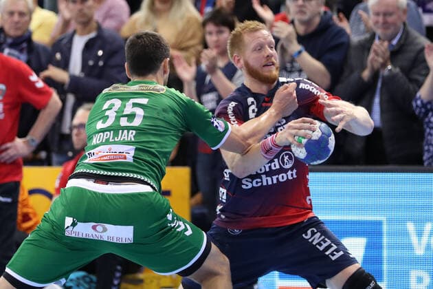 SG Flensburg Handewitt vs Fuechse Berlin, 06 10 19, LIQUI MOLY Handball Bundesliga, Jim Gottfridsson SG Flensburg Handewitt, 24 against Marko Kopljar Fuechse Berlin, 35 Copyright: xBEAUTIFULxSPORTS MarioxM.xKobergx