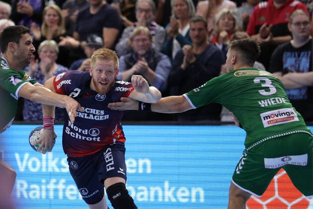 SG Flensburg Handewitt vs Fuechse Berlin, 06 10 19, LIQUI MOLY Handball Bundesliga, Jim Gottfridsson SG Flensburg Handewitt, 24 against Fabian Wiede Fuechse Berlin, 03 and Marko Kopljar Fuechse Berlin, 35 Copyright: xBEAUTIFULxSPORTS MarioxM.xKobergx