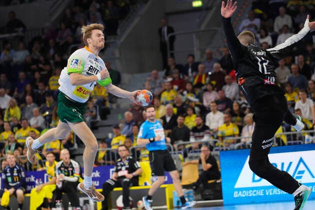Handball Bundesliga Rhein Neckar Loewen vs HSG Wetzlar Mannheim, Germany 06 October 2019 8 Matchday of Liqui Moly Handball Bundesliga Kristian Bjornsen Wetzlar scoring goal against goalkeeper Andreas Palicka Loewen