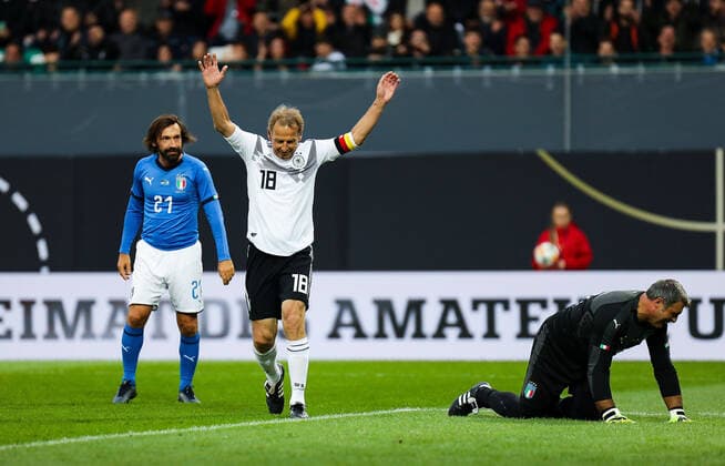 07 10 2019, xmkx, soccer legend game, DFB All Stars Azzurri Legends v l celebrating the goal, cheers for Germany GER by Juergen Klinsmann GER , Andrea Pirlo ITA , Angelo Peruzzi ITA DFL DFB REGULATIONS PROHIBIT ANY USE OF PHOTOGRAPHS as IMAGE SEQUENCES and or QUASI VIDEO Fuerth Bayern Germany DE