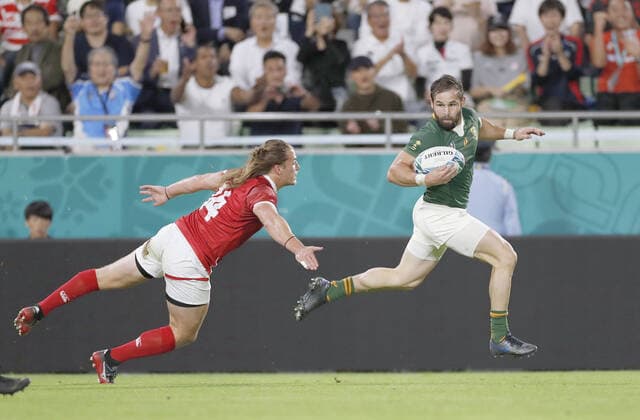 Rugby World Cup in Japan: S. Africa v Canada Cobus Reinach of South Africa runs with the ball on his way to scoring a try during the first half of a Rugby World Cup Pool B match against Canada on Oct. 8, 2019, in Kobe, western Japan. 