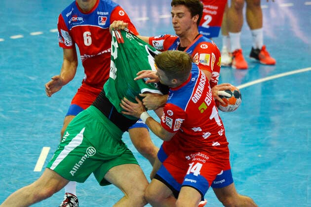 LIQUI MOLY Handball Bundesliga 2019 2020, 9 matchday, SC DHfK Leipzig vs. HBW Balingen Weilstetten 10 10 2019 Duel between Maciej Gebala Kreislaeufer DHfK Leipzig, back number 28 middle against Oddur Gretarsson Aussenspieler Balingen Weilstetten, back number 14 and Lukas Saueressig Backspace player Balingen Weilstetten, back number 26 in Handball Bundesliga Spiel Leipzig vs. Balingen Weilstetten Leipzig Sachsen Deutschland Arena Leipzig