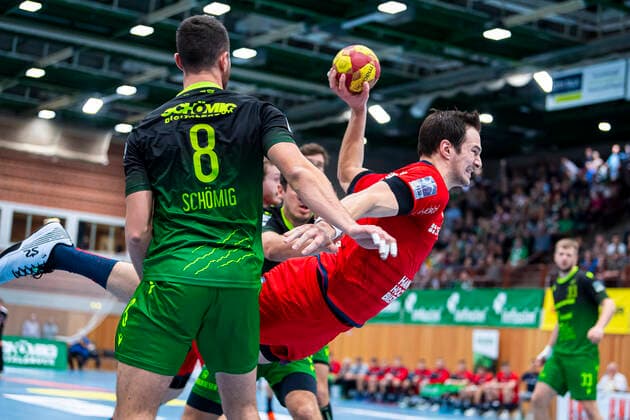Würzburg, Germany 11 October 2019 2 BL 19 20 DjK Rimpar Wölfe vs SG BBM Bietigheim v left Dominik Schoemig Rimpar , Dominik Claus SG BBM Bietigheim Würzburg s Oliver Arena Germany