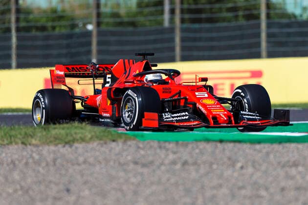 13th October 2019; Suzuka Circuit, Suzuka City, Japan; Formula One Japanese Grand Prix, Race Day; The number 5 Scuderia Ferrari driver Sebastian Vettel on his way to winning pole during qualifying - Editorial Use  ActionPlus12176780 StephenxBlackberry