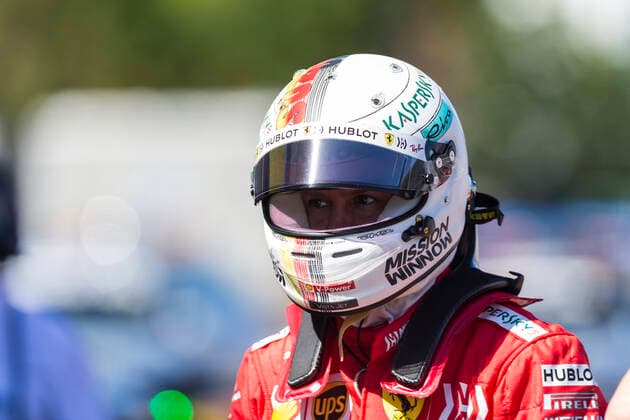 13th October 2019; Suzuka Circuit, Suzuka City, Japan; Formula One Japanese Grand Prix, Race Day; The number 5 Scuderia Ferrari driver Sebastian Vettel after getting pole in qualifying - Editorial Use  ActionPlus12176815 StephenxBlackberry