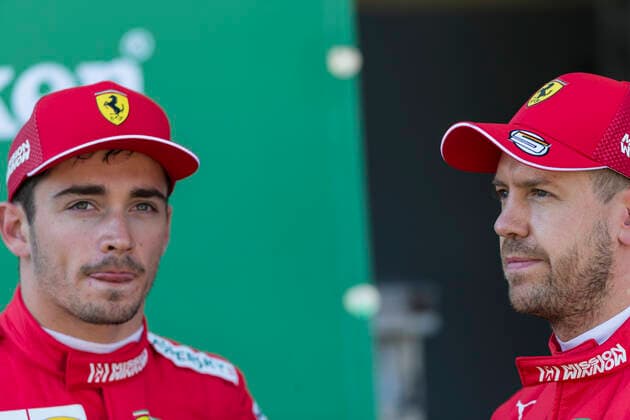 13th October 2019; Suzuka Circuit, Suzuka City, Japan; Formula One Japanese Grand Prix, Race Day; Sebastian Vettel and Charles Leclerc after qualifying first and second - Editorial Use  ActionPlus12176821 StephenxBlackberry