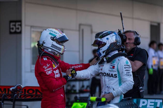 13th October 2019; Suzuka Circuit, Suzuka City, Japan; Formula One Japanese Grand Prix, Race Day; Sebastian Vettel shakes the hand of winner Valtteri Bottas& x2019;s after the race - Editorial Use  ActionPlus12176874 StephenxBlackberry