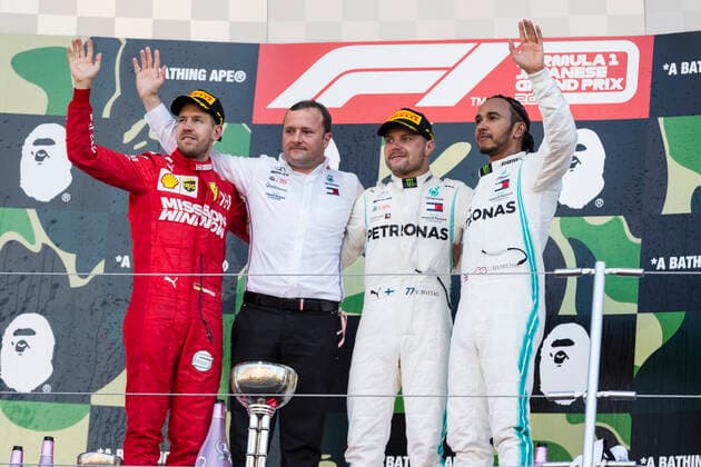13th October 2019; Suzuka Circuit, Suzuka City, Japan; Formula One Japanese Grand Prix, Race Day; Sebastian Vettel, Valtteri Bottas, Lewis Hamilton on the podium after the race - Editorial Use  ActionPlus12176879 StephenxBlackberry