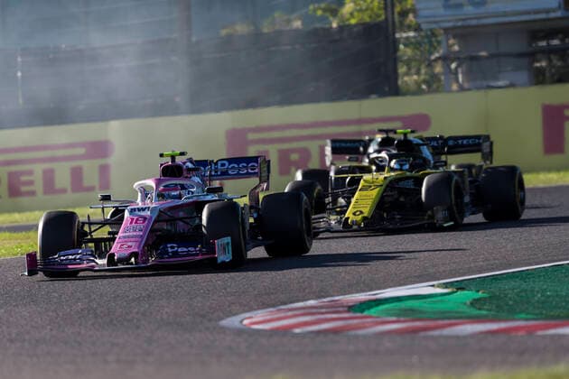 13th October 2019; Suzuka Circuit, Suzuka City, Japan; Formula One Japanese Grand Prix, Race Day; Lance Stroll locks up in front of Nico Hulkenberg during the race - Editorial Use  ActionPlus12176943 StephenxBlackberry
