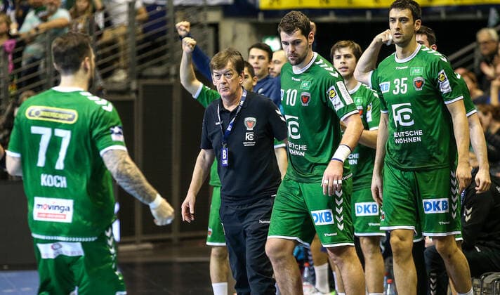 13 10 2019, Handball, 1 Bundesliga, 9 Matchday, Foxes Berlin Bergischer HC, Max Schmeling Hall Foxes players cheer, Berlin coach Velimir Petkovic 2 v l looks proud Handball 1 Bundesliga Foxes Berlin Bergischer HC