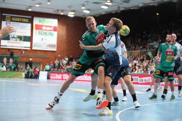 Christoffer Rambo TSV GWD Minden 9 against Magnus Joendal SG Flensburg Handewitt 18 right GER, Handball, 1 Bundesliga, TSV GWD Minden against SG Flensburg Handewitt, 13 10 2019 Minden Copyright: xEIBNER JanxStrohdiekx EP_JSK