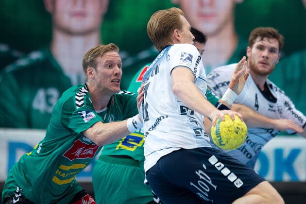 Minden, Germany 13 10 2019 1 Handball Bundesliga 2019 2020 GWD Minden vs SG Flensburg Handewitt L R Magnus Gullerud Minden , Simon Jeppsson Flensburg Minden Nordrhein Westfalen Germany Kampa Halle
