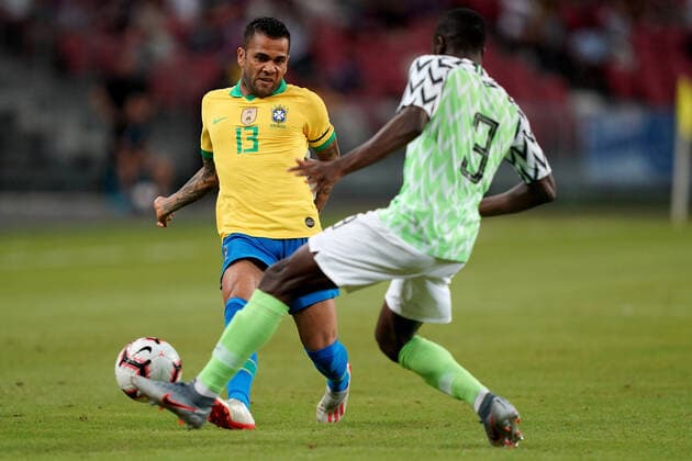 13th October 2019; National Stadium Singapore, Singapore; International Friendly, LÃ¤nderspiel, Nationalmannschaft Brazil versus Nigeria; Daniel Alves of Brazil takes on Jamilu Collins of Nigeria -Editorial Use  ActionPlus12177169 StanleyxChou