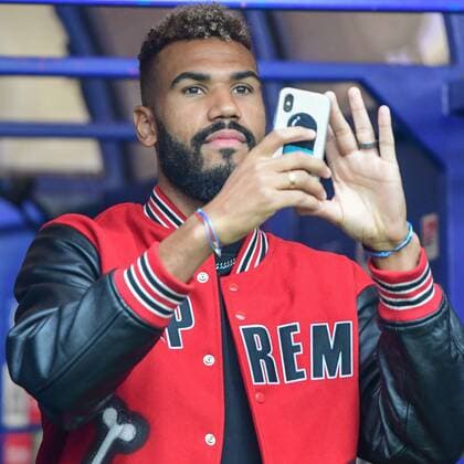 Eric Maxim Choupo Moting also looked over and made a mobile phone photo Germany , Hamburg , Volksparkstadion , Rafael van der Vaart farewell game , Rafa s HSV Stars vs Rafa s All Stars