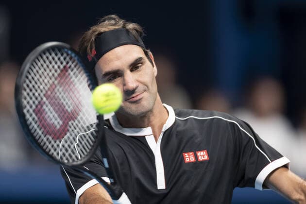October 14, 2019, Tokyo, Japan: Roger Federer is in his match v John Isner during the UNIQLO Life Wear Day Tokyo charity event at Ariake Coliseum. Professional tennis player Roger Federer who is UNIQLO Global Ambassador took part in a charity event in Tokyo. Federer announced his plans to compete at the Tokyo 2020 Olympics Games. Roger Federer plans to compete in the Tokyo 2020 Olympic Games, Olympische Spiele, Olympia, OS - ZUMAm191 20191014_zap_m191_001 Copyright: xRodrigoxReyesxMarinx